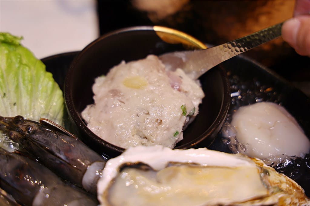 台南美食-七股鮮黃金鍋 採用虱目魚高湯底製成的黃金蜆鍋~ 頂