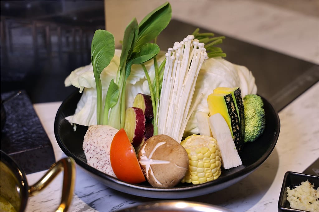 台南美食-七股鮮黃金鍋 採用虱目魚高湯底製成的黃金蜆鍋~ 頂